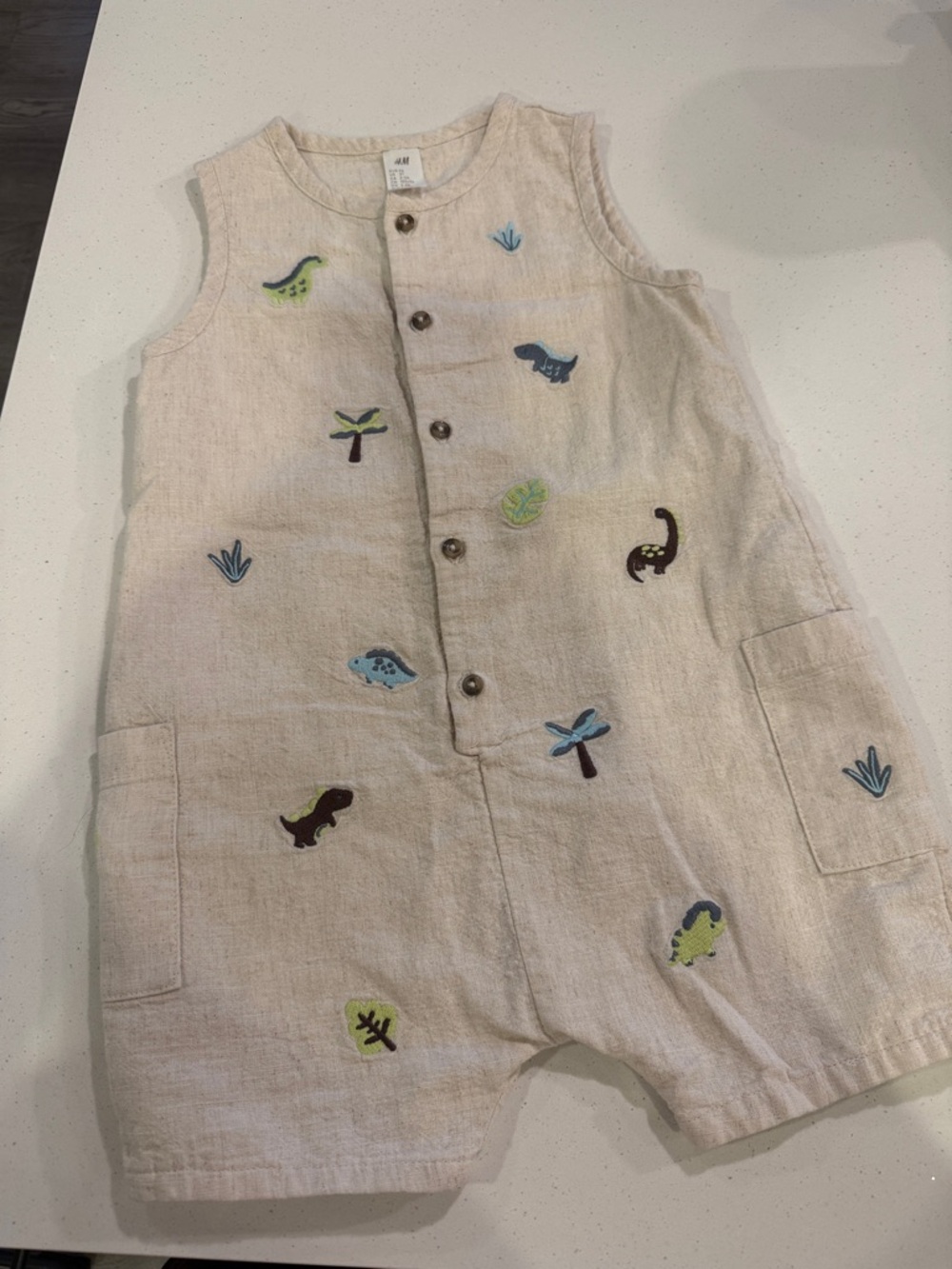 H&M Natural Linen Baby Romper with Dino Motifs